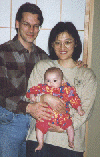 Family in the tatami room. Sara 6 months old. 1999/4? by Dan Smith. (17.jpg 55k)